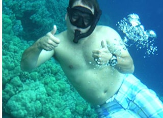 Dr. Griffin underwater wearing diving gear.